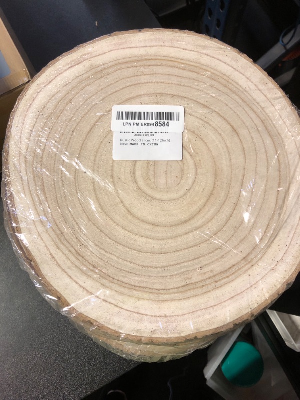 Photo 1 of Wood Slices 11-12 Inch Extra-Large Wood Rounds 8 Pack Round Wooden Discs Natural Wood Centerpieces for Tables Unfinished Wood Slices for Centerpieces,Rustic Decor & DIY