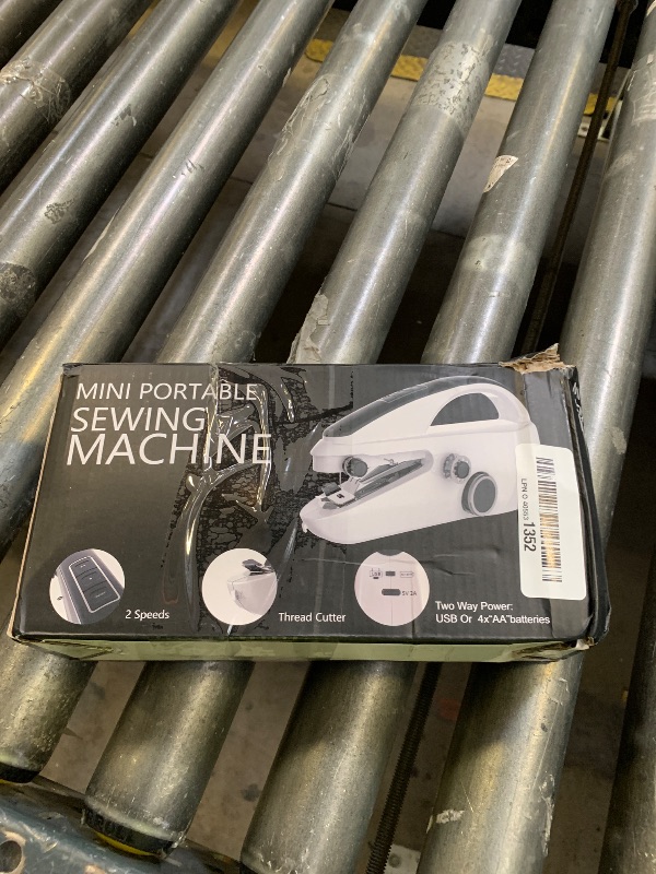 Photo 1 of Handheld Sewing Machine,Portable,Mini Sewing Machine,Easy to Use,Fast Sewing Speed,Suitable for Sewing Clothes,Fabric,DIY Home Machine for Beginners.Black