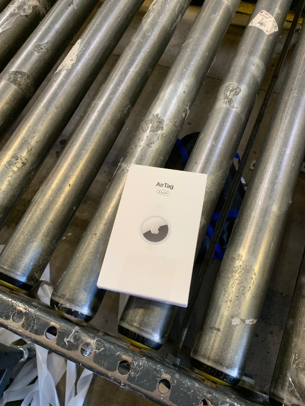 Photo 1 of Apple AirTag 4 Pack. Keep Track of and find Your Keys, Wallet, Luggage, Backpack, and More. Simple one-tap Set up with iPhone or iPad