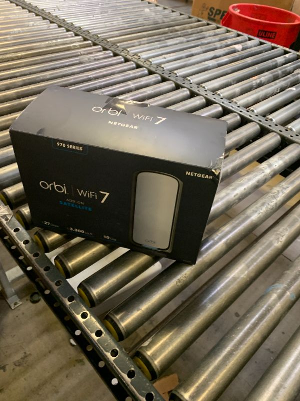 Photo 1 of NETGEAR Orbi 970 Series (RBE970) Quad-Band WiFi 7 Mesh Add-on Satellite - Works with Existing 970 Series (973/972/971S), Security Features, Covers up to 3,300 sq. ft., BE27000 802.11be