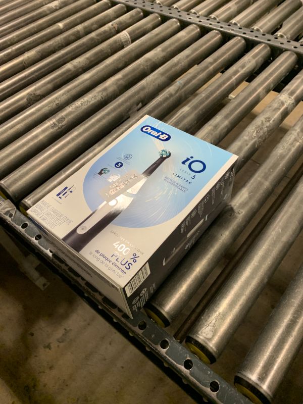 Photo 1 of Oral-B iO Deep Clean Rechargeable Electric Powered Toothbrush, Black with iO Series 3 Limited, 2 Brush Heads and Travel Case - Pressure Sensor to Protect Gums - 3 Cleaning Settings - 2 Minute Timer