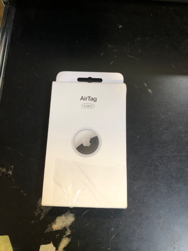 Photo 1 of Apple AirTag 4 Pack. Keep Track of and find Your Keys, Wallet, Luggage, Backpack, and More. Simple one-tap Set up with iPhone or iPad