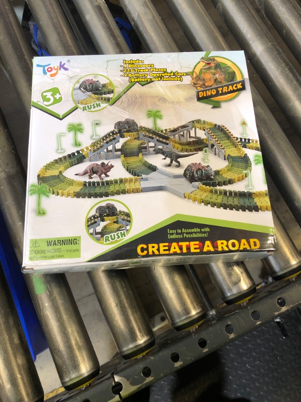 Photo 1 of Dinosaur Toys,Create A Dinosaur World Road Race,Flexible Track Playset and 2 pcs Cool Dinosaur car for 3 4 5 6 Year & Up Old boy Girls Best Gift