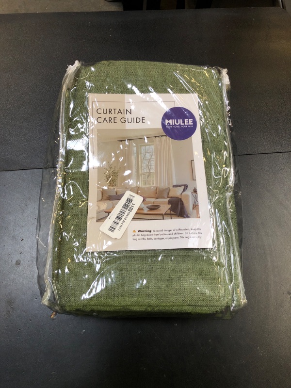 Photo 1 of MIULEE 100% Blackout Linen Textured Curtains for Bedroom Solid Thermal Insulated Olive Green Grommet Room Darkening Curtains & Drapes Luxury Decor for Living Room Nursery 52 x 96 Inch (2 Panels)