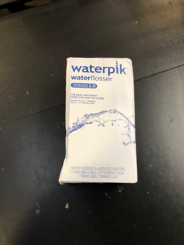 Photo 1 of Waterpik Cordless Advanced 2.0 Water Flosser For Teeth, Gums, Braces, Dental Care With Travel Bag and 4 Tips, ADA Accepted, Rechargeable, Portable, and Waterproof, Black WP-582, Packaging May Vary