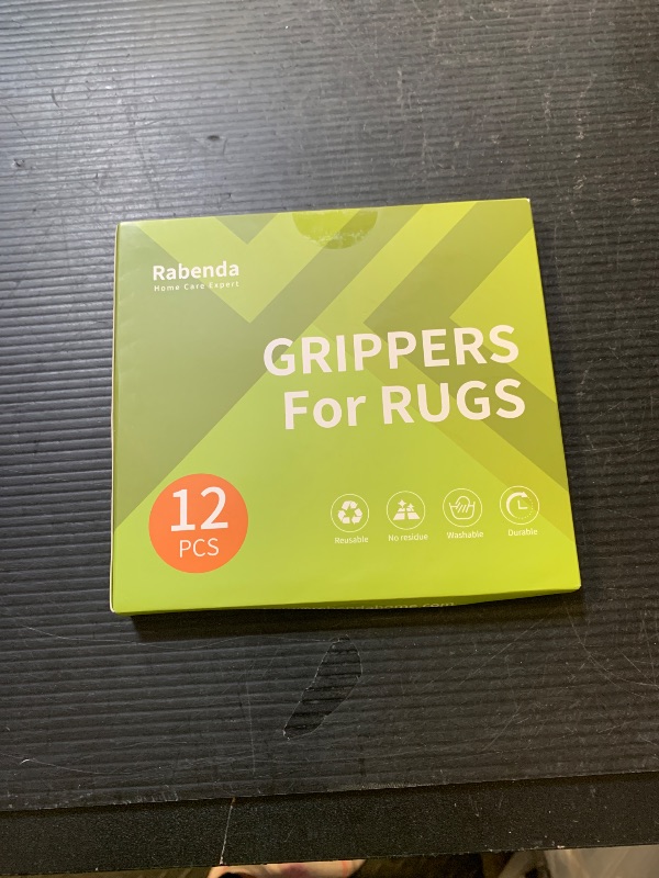 Photo 1 of Rabenda 12 Pcs Rug Tape, Non Slip Rug Pads Grippers for Hardwood Floors and Tiles, Reusable Carpet Tape for Area Rugs, Double-Sided Adhesive Rug Stickers Keep Corners Flat (Black)