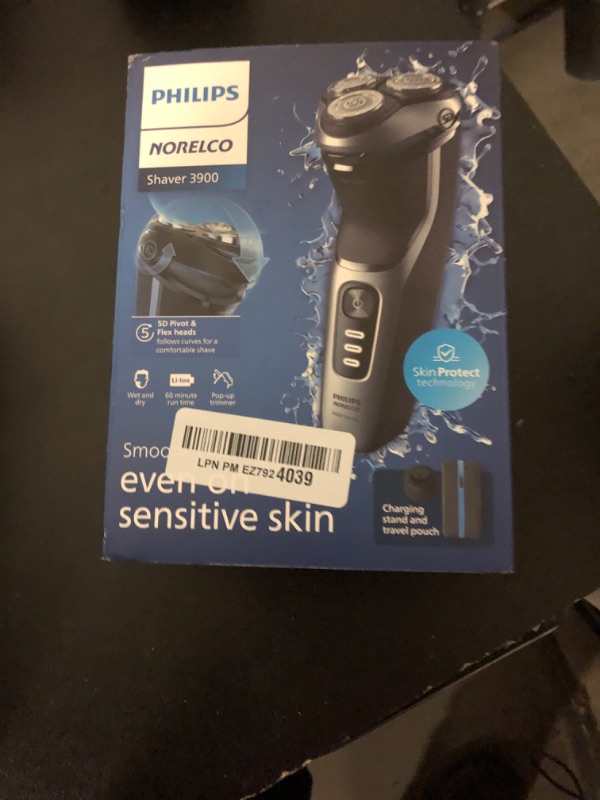 Photo 1 of Philips Norelco Shaver 3900 Series, Wet and Dry Electric Shaver, P-Cap, Travel Pouch, Charging Stand, Storm Blue, Model S3341/92
