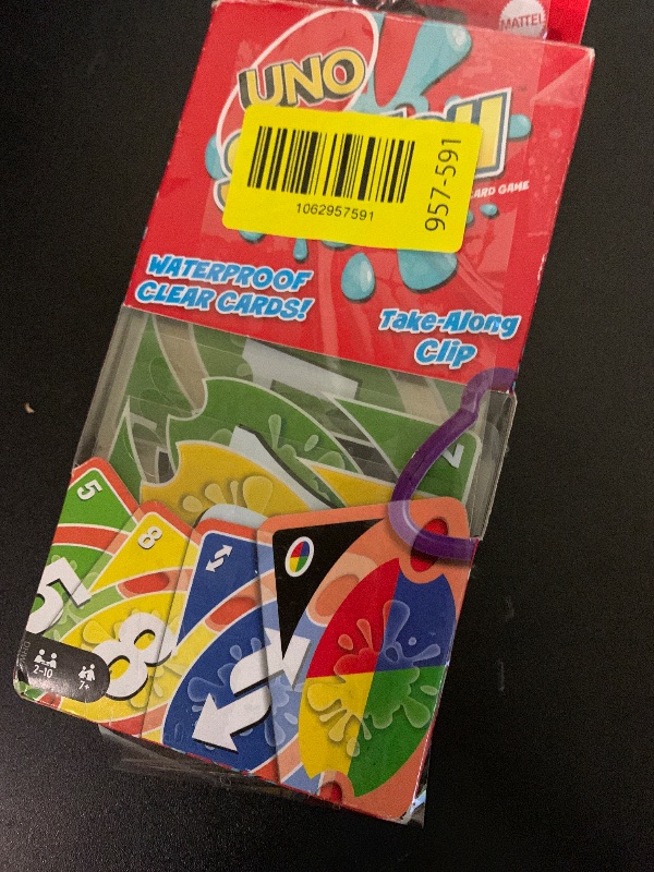 Photo 1 of Mattel Games UNO Splash Card Game with Waterproof Cards and Portable Clip for Travel, Camping and Game Nights Away