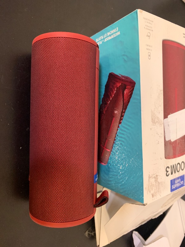 Photo 1 of Ultimate Ears Boom 3 Wireless Bluetooth Speaker, Bold Sound + Deep Bass, Bluetooth, Magic Button, Waterproof, 15 Hours Battery, Range of 150 ft, Sunset Red