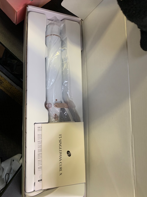 Photo 1 of T3 SinglePass Curl X Extra-Long Barrel Curling Iron with 9 Heat Settings and Ceramic Barrel for Fast Styling and Lasting Results on All Hair Types