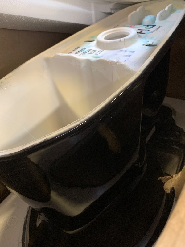 Photo 1 of TOTO Drake Two-Piece Elongated 1.28 GPF Universal Height TORNADO FLUSH Toilet, Ebony - CST776CEF#51