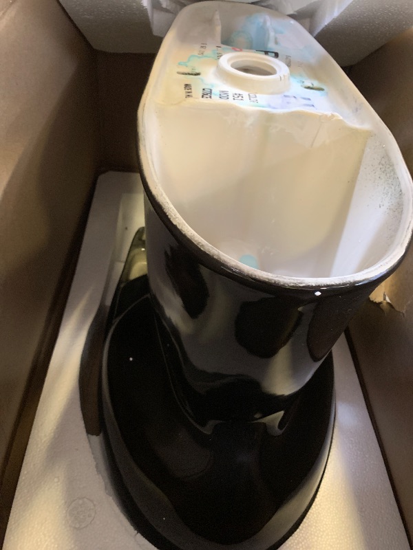 Photo 1 of TOTO Drake Two-Piece Elongated 1.28 GPF Universal Height TORNADO FLUSH Toilet, Ebony - CST776CEF#51