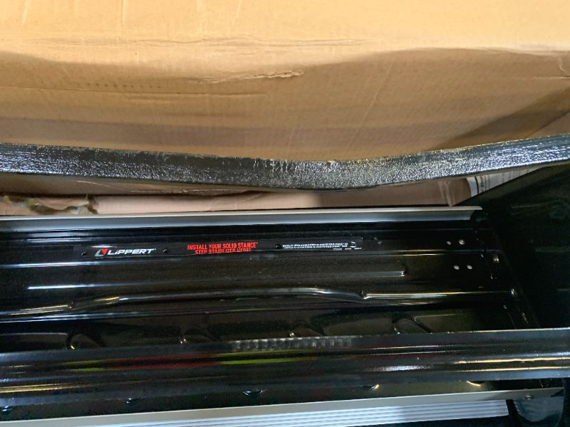 Photo 1 of Lippert Components 432696 Alumi-Tread Triple Manual Step , Black