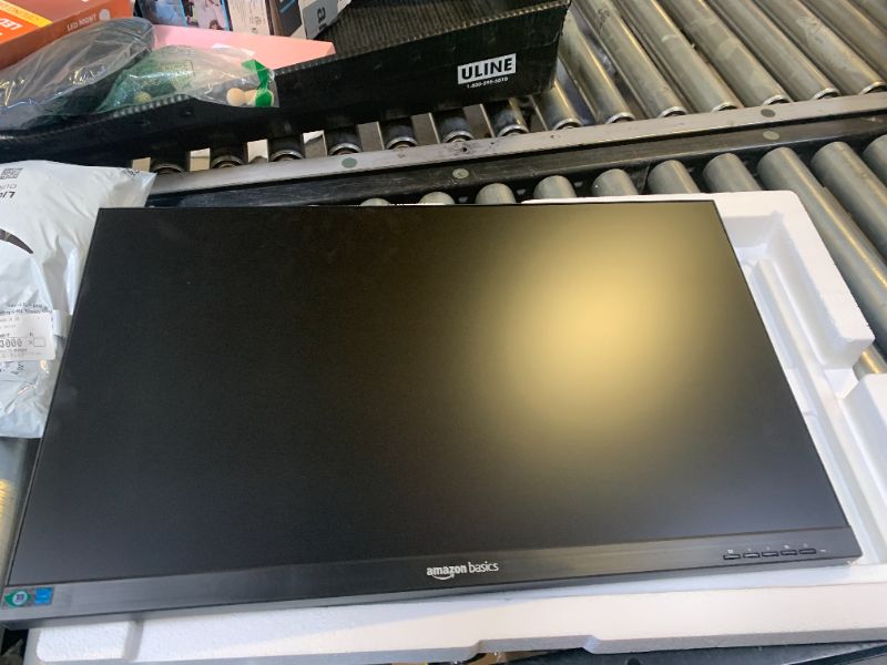 Photo 1 of Amazon Basics IPS Monitor 75 Hz Powered with AOC Technology FHD 1080P HDMI, Display Port and VGA Input VESA Compatible Built-in Speakers for Office and Home, 27 in, Black