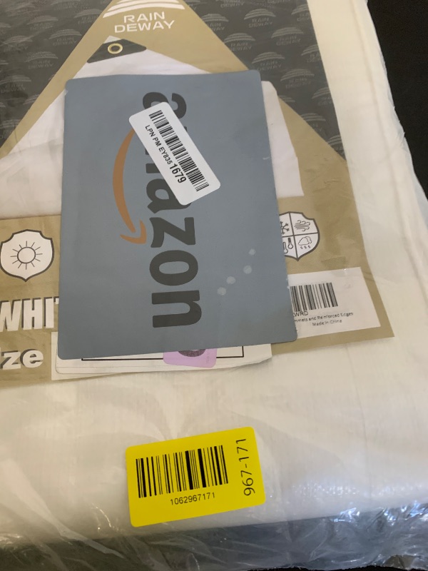 Photo 1 of RAINDEWAY 12 Mil Heavy Duty White Tarp 10x15 Feet, UV Resistant, Waterproof, Weatherproof Poly Tarp with Metal Grommets and Reinforced Edges