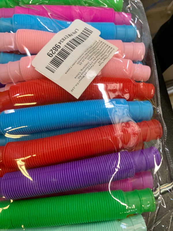 Photo 1 of 52 Pack Pop Tubes, Sensory Toys Party Favors For Kids 8-12 4-8 Fidget Toys For Anxiety Goodie Bag Stuffers Treasure Box Classroom Prizes Gifts for 3 4 5 6 7 8 9 Year Old Boys Girls Toddlers- 10 Colors