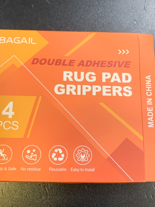 Photo 1 of BAGAIL 4 Pcs Rug Gripper Pad, Non Slip Rug Corner Grippers for Hardwood Floors, Strong Adhesive Flexible Carpet Tape, Reusable Under Rug Stickers to Keep Rugs in Place