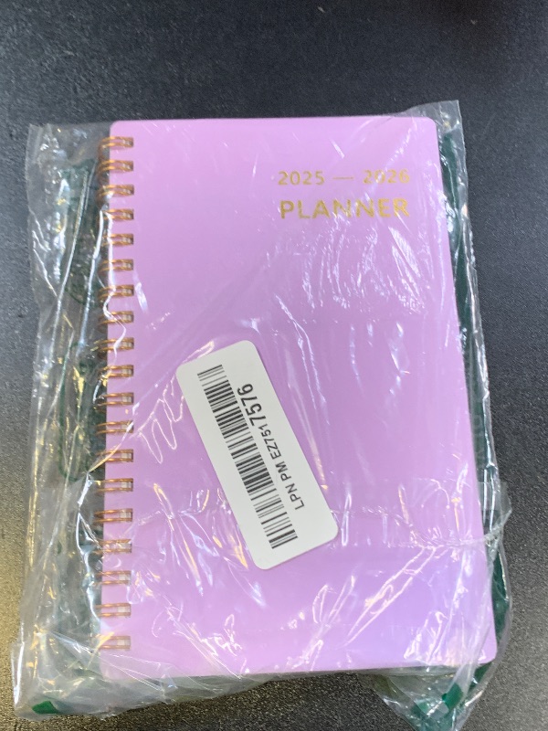 Photo 1 of HAUTOCO 2025-2026 Pocket Calendar Weekly & Monthly Planner (July 2025 - June 2026) Spiral Bound for Purse 4.3 x 6.7'', Small Planner Pocket Size Daily Agenda Book with Tabs, Pouch, PP Cover, Purple
