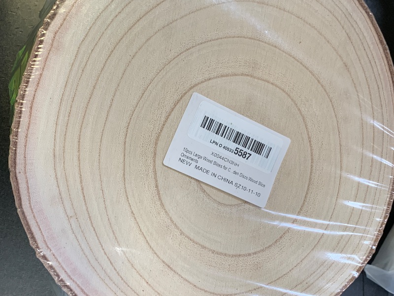 Photo 1 of SENMUT 10 Pcs Large Wood Slices for Centerpieces 10-11 inches Wood Rounds for Tables Decor Rustic Wood Circles for DIY Crafts and Wedding Decor Round Wooden Discs Wood Slice Ornaments