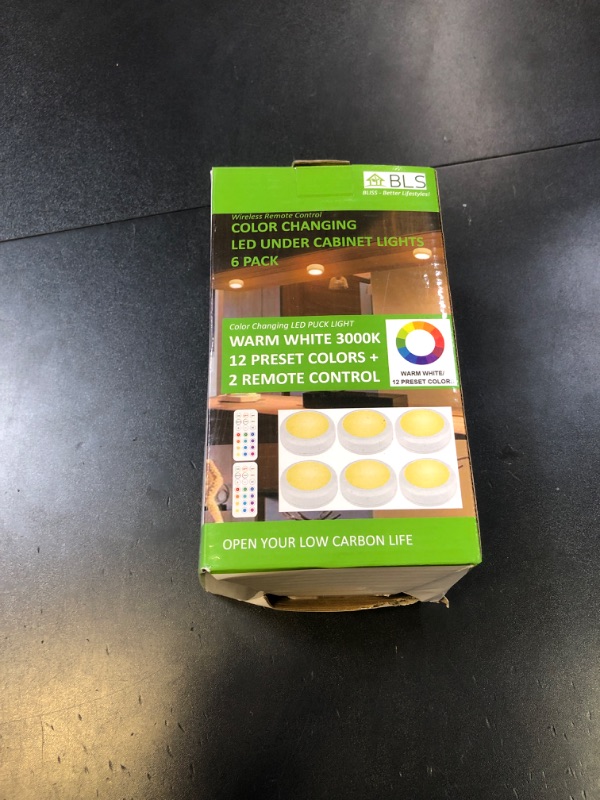 Photo 1 of Alivation Led Under Cabinet Lighting Battery Operated Light, 6 Puck Lights with Remote Control, 13 Color Changing Stick on, Touch Push Tap Lights for Kitchen, Closet, Bookshelf, Stair, Display