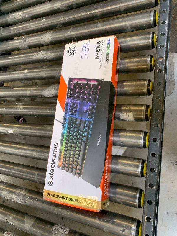 Photo 1 of SteelSeries USB Apex 5 Hybrid Mechanical Gaming Keyboard – Per-Key RGB Illumination – Aircraft Grade Aluminum Alloy Frame – OLED Smart Display (Hybrid Blue Switch)