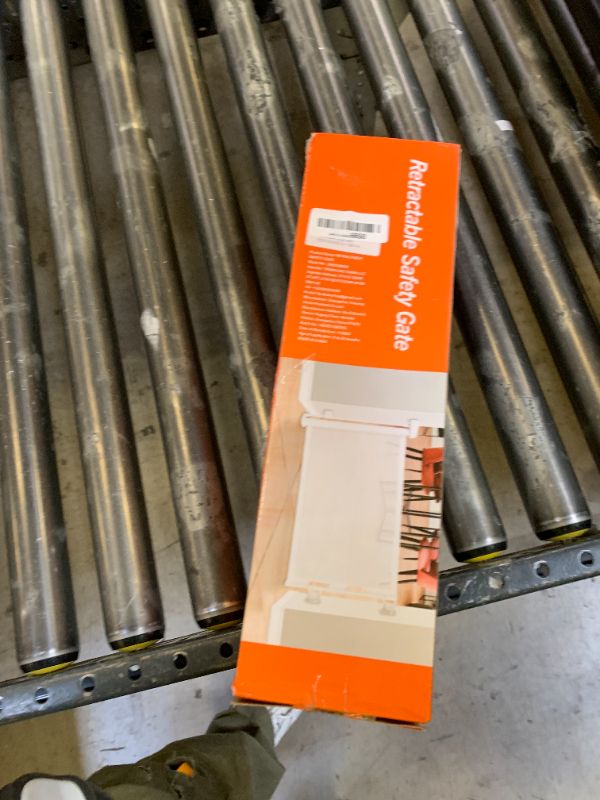 Photo 1 of 14" H Dog Gate - Puppy and Small Dog Gates, Retractable Mesh Step Over Pet Fence, Expands Up to 59" Indoor/Outdoor, Perfect for Doorways & Stairs