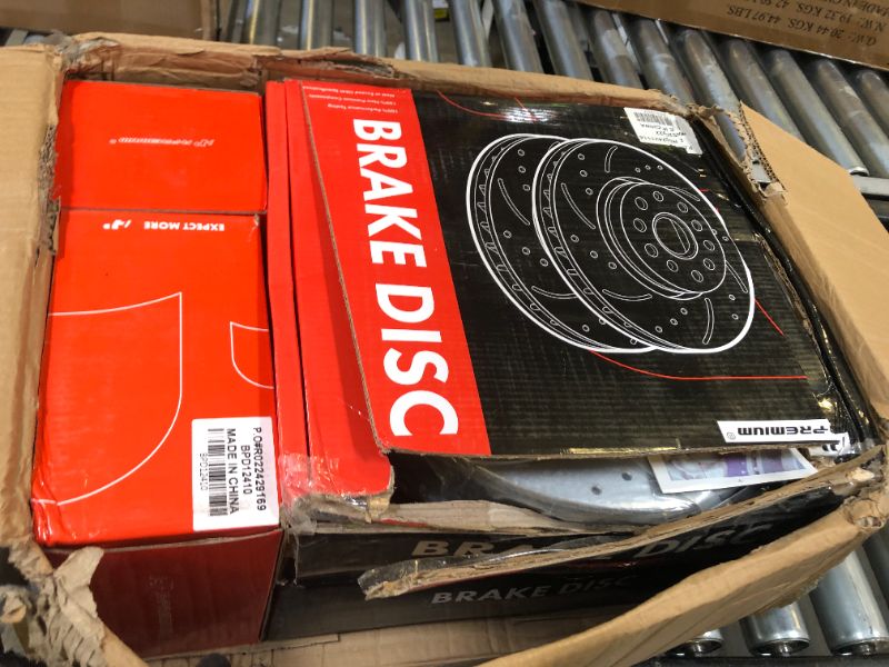 Photo 1 of a premium front and rear drilled and slotted disc brake rotors and ceramic pads for select jaguar models