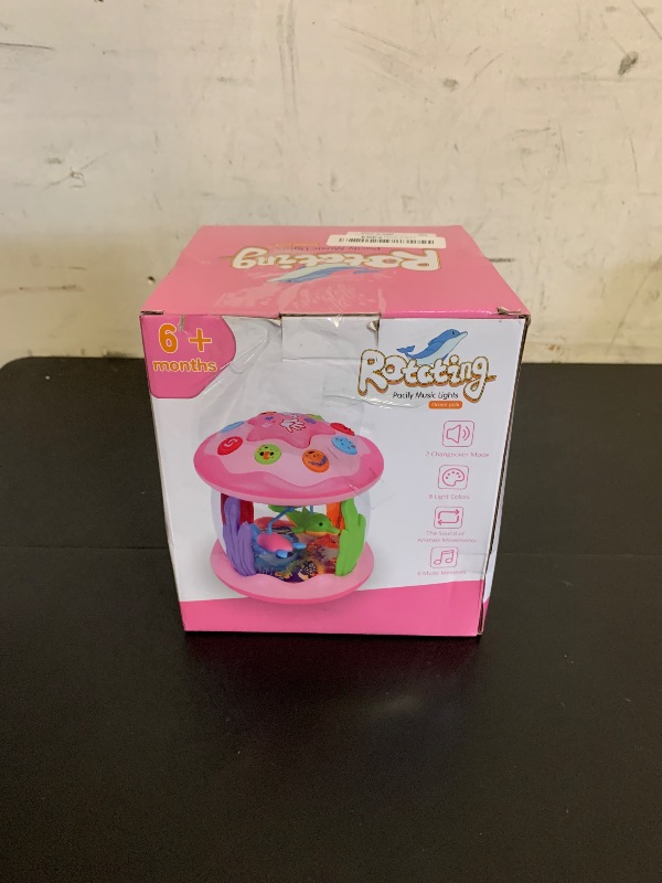 Photo 1 of Hapyland Baby Toys 6-12 Months Girl Gifts: Babies Ocean Rotating Light Up Musical Toys for Toddlers 1 2 Year Old Crawling Learning Infant Toy 6 7 8 9 10 11 12 Months Old Baby Girl Gift (Pink)