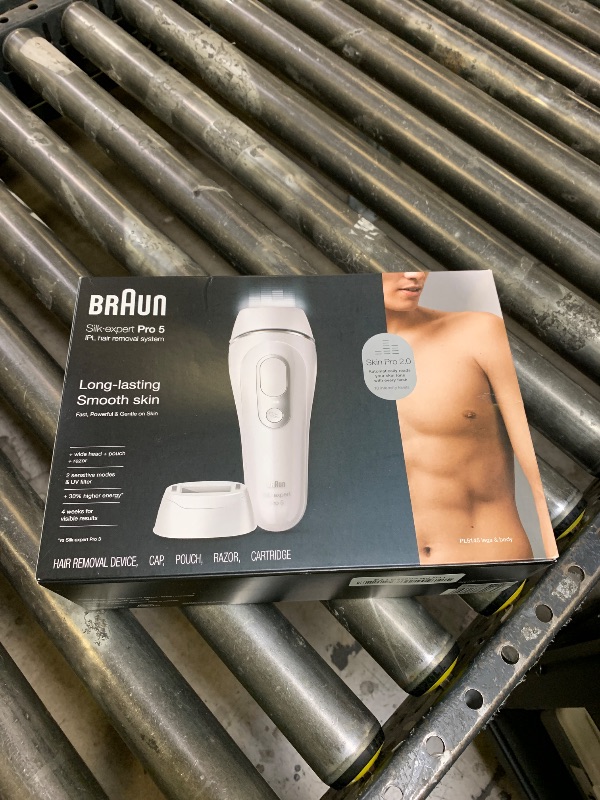 Photo 1 of Braun Smart IPL, Silk·Expert Pro 5: at Home Laser Hair Removal Device for Men & Women, Permanent Visible Hair Reduction in Hair Regrowth for Body, w/Razor, Pouch, and Wide Cap Head, IPL5145