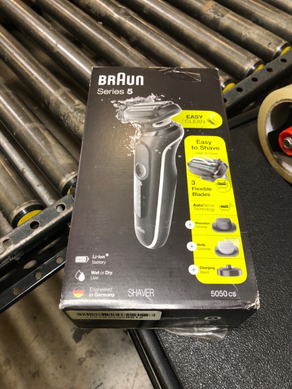 Photo 1 of Braun Electric Razor for Men, Waterproof Foil Shaver, Series 5 5050cs, Wet & Dry Shave, with Beard Trimmer and Body Groomer, Rechargeable, Charging Stand Included, Blue