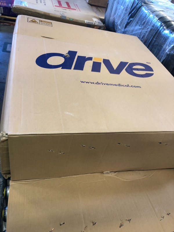 Photo 1 of Drive Medical BLS18FBD-ELR Blue Streak Lightweight Wheelchair with Swing-Away Elevating Leg Rests and Flip-Back Arms