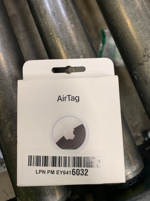 Photo 1 of Apple AirTag. Keep Track of and find Your Keys, Wallet, Luggage, Backpack, and More. Simple one-tap Set up with iPhone or iPad