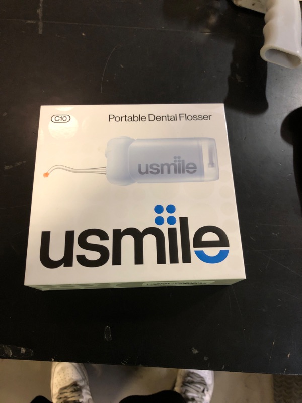 Photo 1 of usmile C10 Portable Water Flosser – Travel-Friendly, 95-Day Battery, 4 Modes, 360° Nozzle, 180ml Tank, IPX7 Waterproof, Dentist-Recommended for Braces, Implants & Sensitive Gums (Blue)