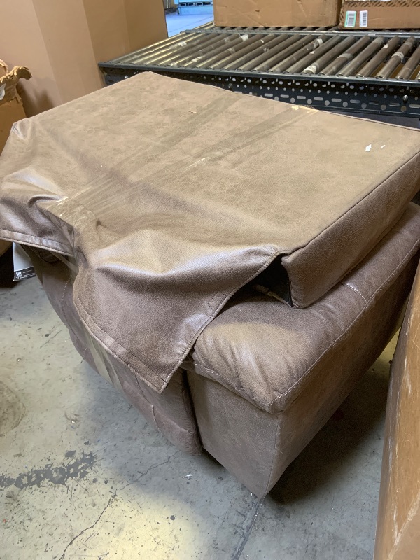Photo 1 of Signature Design by Ashley Stoneland Faux Leather Power Rocker Recliner, Light Brown