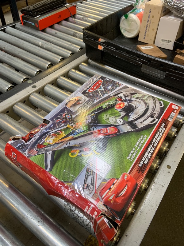 Photo 1 of Mattel Disney and Pixar Cars Track Set, Piston Cup Action Speedway Playset with 1:55 Scale Lightning McQueen Die-Cast Toy Car