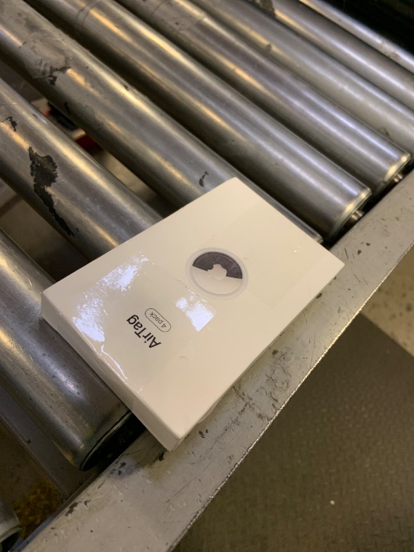 Photo 1 of Apple AirTag 4 Pack. Keep Track of and find Your Keys, Wallet, Luggage, Backpack, and More. Simple one-tap Set up with iPhone or iPad