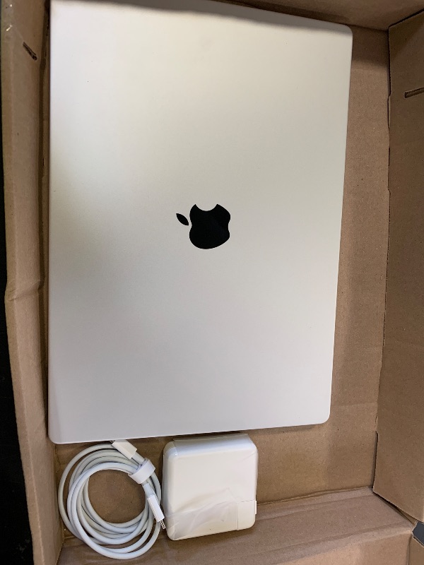 Photo 1 of Apple MacBook Pro Late 2021 with Apple M1 Pro chip (16-inch, 16GB RAM, 512GB SSD) Space Gray (Renewed)
