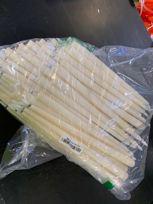 Photo 1 of Baquler 100 Pcs Flameless Taper Candles Battery Operated Bulk 12.4 Ivory LED Taper Candles Flickering LED Candlesticks for Wedding Advent Halloween Christmas Party Decor