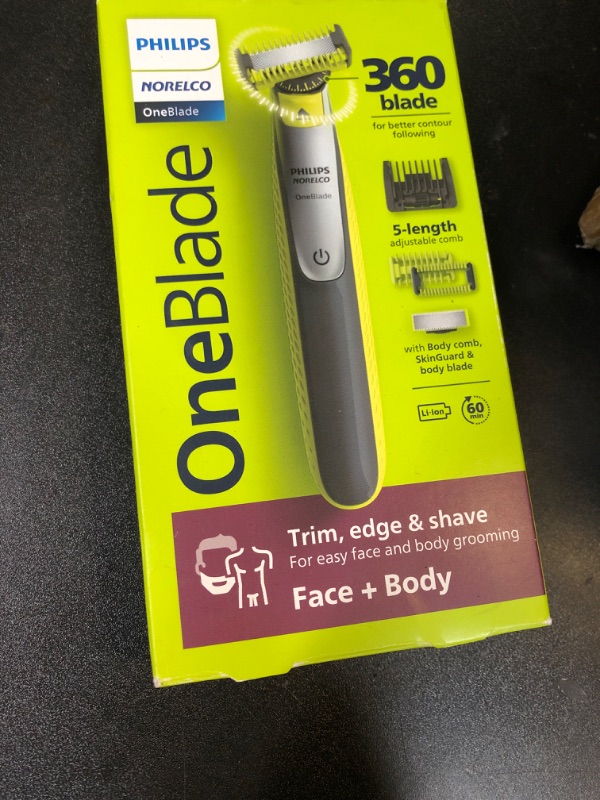 Photo 1 of Philips Norelco OneBlade 360 Hybrid Blade for Face + Body, Electric Beard Trimmer, Shaver and Groomer, with 360 Blade Technology, 5in1 Adjustable Comb, 1x Body Kit, Model QP2834/70, Black/Lime Green