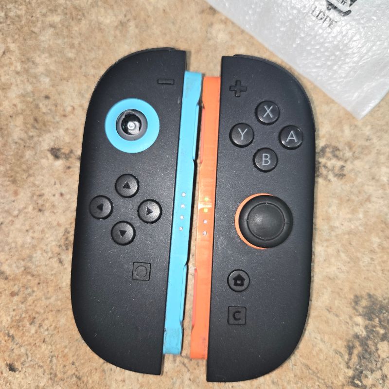 Photo 1 of ***MAJOR DAMAGE*** Nintendo Joy-Con 2 (L)/(R) Light Blue/Light Red