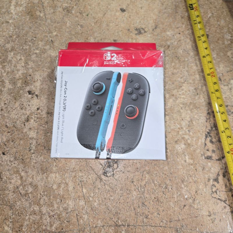 Photo 1 of ***MAJOR DAMAGE*** Nintendo Joy-Con 2 (L)/(R) Light Blue/Light Red