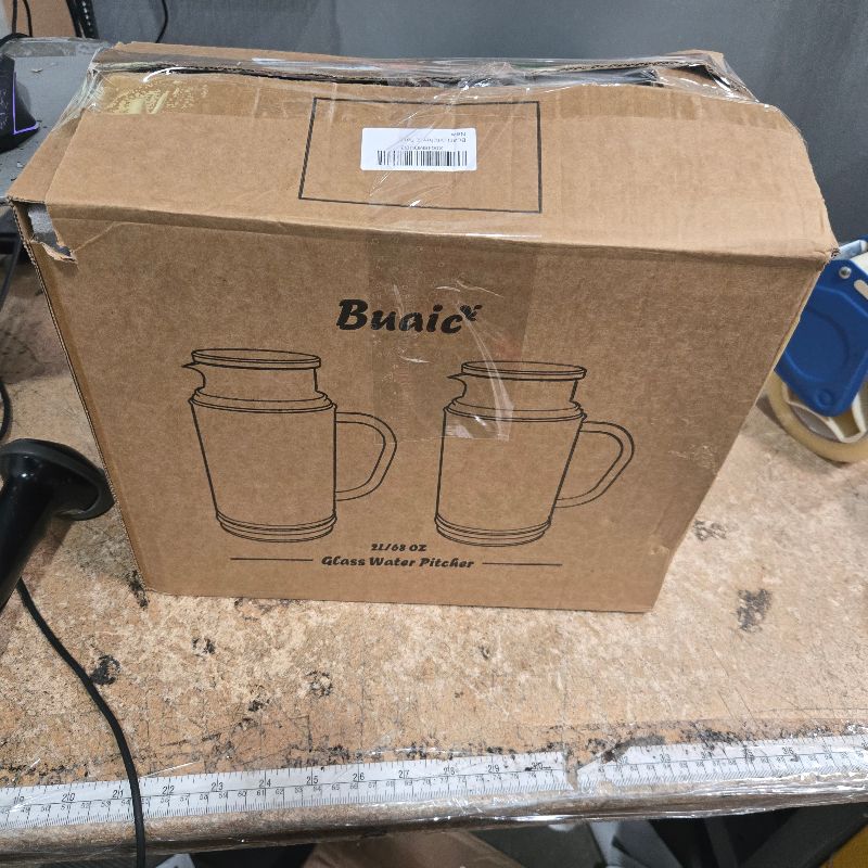 Photo 1 of ***ONLY ONE**** Buaic Glass Pitcher with Lid, 68 oz/ 2 Liter Classic Vertical Stripes Water Pitcher with Yellow Handle,Glass Water Carafe for Cold Brew, Coffee, Lemonade, Iced Sun Tea,Beverage,Heat Resistant