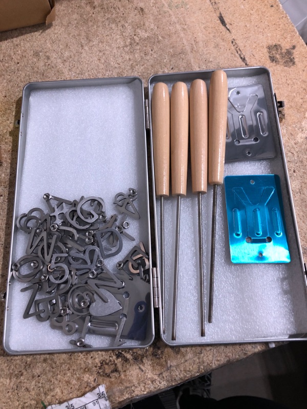Photo 1 of ***POSSIBLY FOR PARTS LETTERING COMES OUT BACKWARDS**** Moxweyeni 44 Pcs Mini 1" Branding Iron Kit A-Z Alphabet 0-9 Numbers 8 Symbols Branding Iron for Wood Working DIY Leather Hat Craft Steak Bread Logo with 4 Handles 3 Metal Holder and Metal Storage Box
