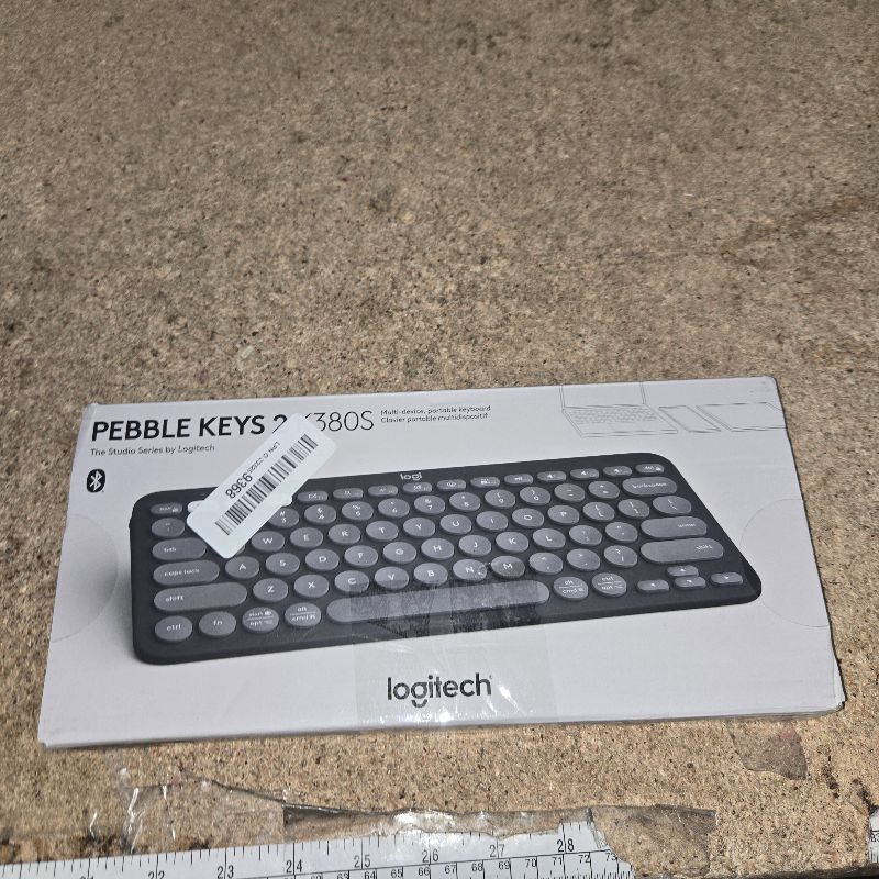 Photo 1 of **Two Es** Logitech Pebble Keys 2 K380s, Multi-Device Bluetooth Wireless Keyboard with Customizable Shortcuts, Slim and Portable, Easy-Switch for Windows, macOS, iPadOS, Android, Chrome OS - Tonal Graphite