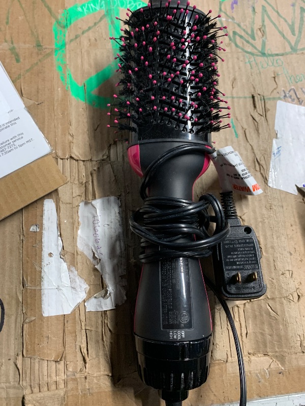 Photo 1 of ***(HEAVILY USED/ MINOR DAMAGE)***REVLON One-Step Volumizer Hair Dryer and Styler with Improved Motor – Easy Salon-Style Blowouts – Less Frizz, More Shine, and Reduced Heat Damage, for All Hair Types and Lengths (Black)
