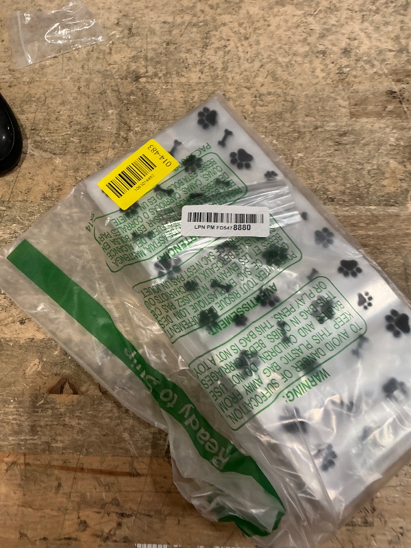 Photo 1 of 100 Paw Print Dog Treat Bags - Heat Sealable Candy Bags with 100 Silver Twist Ties for Pet Birthday Party Favor Supplies, Black