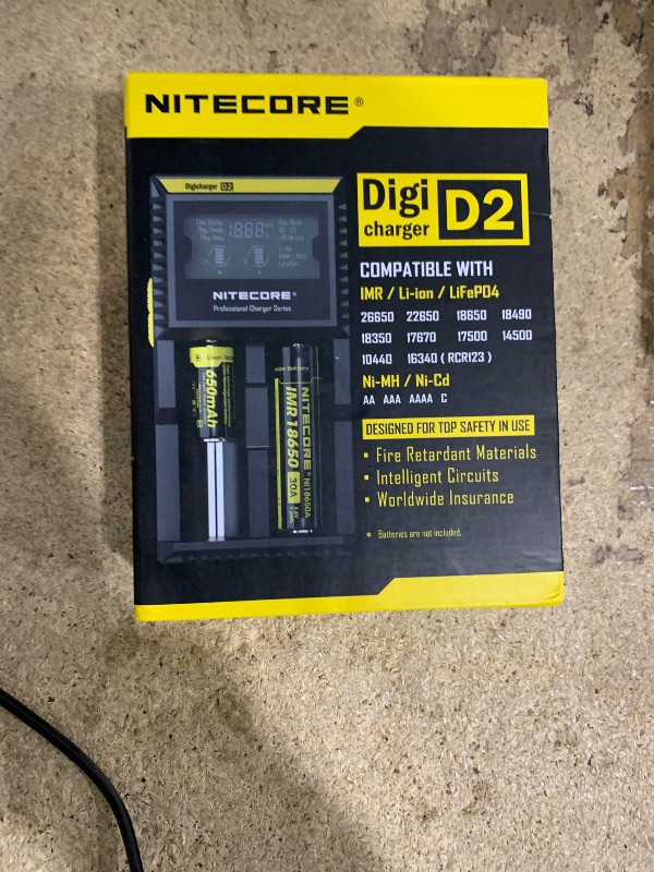 Photo 1 of ***DIRTY/ STYLE DIFFERS**** Nitecore D2 smart Charger 2015 version with LCD display For Li-ion, IMR, LiFePO4 26650 22650 18650 17670 18490 17500 18350 16340 RCR123 14500 10440 Ni-MH And Ni-Cd AA AAA AAAA C Rechargeable Batteries with Ac and 12V DC (Car) p