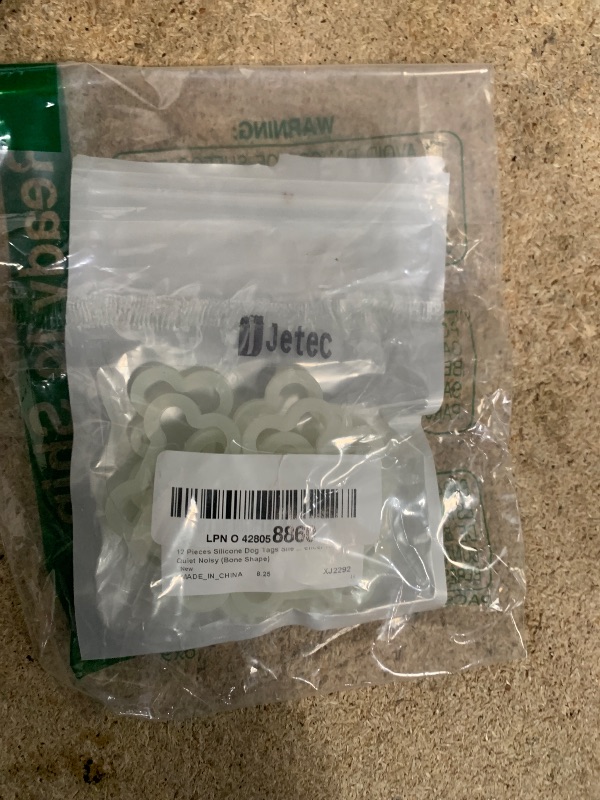 Photo 1 of 12 Pieces Silicone Dog Tags Silencer Dog Pet Name Tag Glow in The Dark Silencer to Quiet Noisy (Bone Shape)