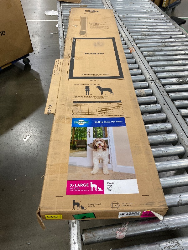Photo 1 of (used)(damaged)(please see all images) PetSafe Sliding Glass Pet Door - No-Cut DIY Install Doggy Door for Renters - Aluminum Frame - Adjustable Height 75 7/8" to 81" - Ideal for Extra Large Dogs Up to 220 lb - White