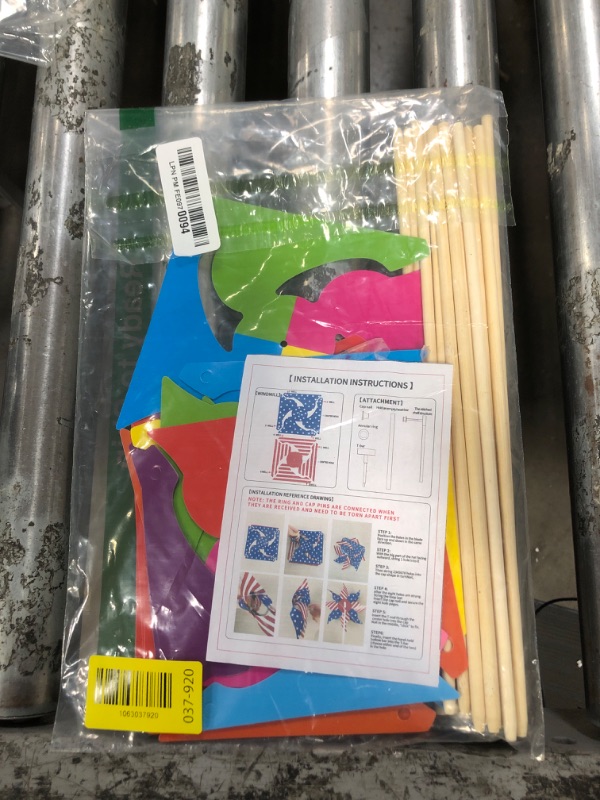 Photo 1 of 12 Pack Rainbow Pinwheels for Yard and Garden, Colorful Rainbow Pinwheels Party Decorations for Outdoor, Lawn, Garden